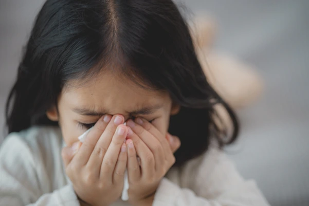 A child with cold or flu symptoms