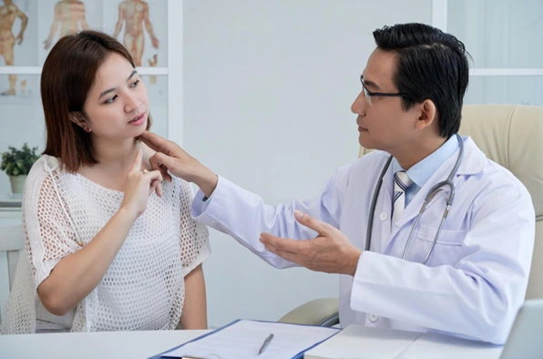 A medical consultation session with a thyroid specialist A medical consultation session with a thyroid specialist