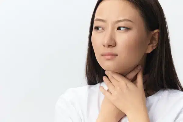 A woman with a thyroid condition or neck lump A woman with a thyroid condition or neck lump